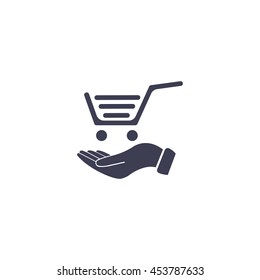 hand holding a shopping cart online store. icon. Vector Eps 10