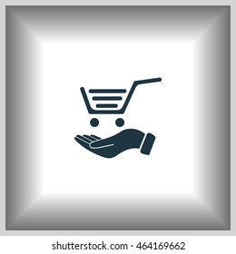 hand holding a shopping cart online store. icon. Vector Eps 10