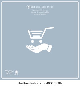 hand holding a shopping cart online store. icon. Vector Eps 10