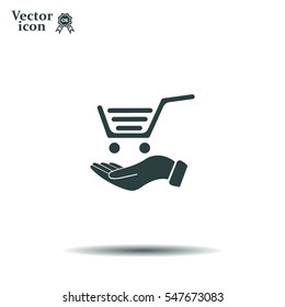 hand holding a shopping cart online store. icon. Vector Eps 10