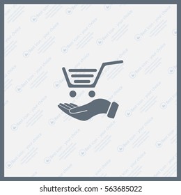 hand holding a shopping cart online store. icon. Vector Eps 10