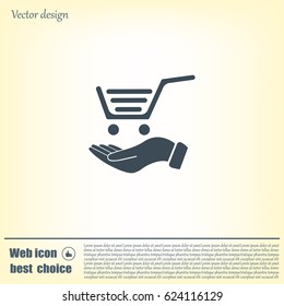 hand holding a shopping cart online store. icon. Vector Eps 10