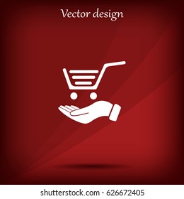 hand holding a shopping cart online store. icon. Vector Eps 10