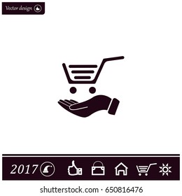 hand holding a shopping cart online store. icon. Vector Eps 10