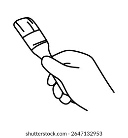 hand holding small brush black and white line art