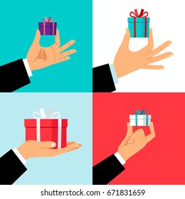 Hand holding small gift box set. Hands giving presents for offering or christmas concepts. Vector illustration