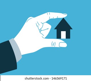 Hand Holding Small House