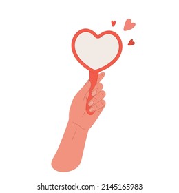 Hand holding small mirror.Love yourself concept.Female hand hold heart shaped,makeup mirror.Simple vector illustration in cartoon style isolated on white background.