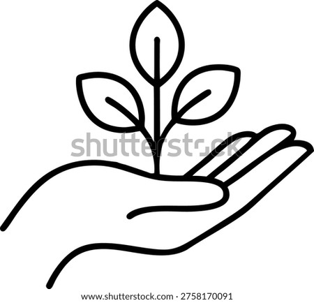 Hand holding a small plant representing growth, nature, sustainability and eco-friendly concept