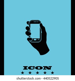 Hand holding smart phone.