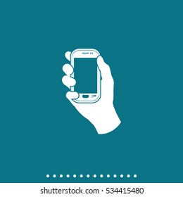 Hand holding smart phone.