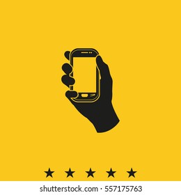 Hand holding smart phone.