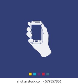 Hand holding smart phone.