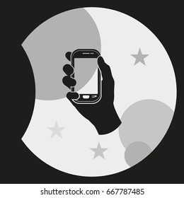 Hand holding smart phone.