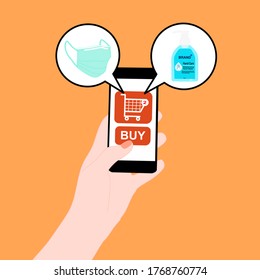 Hand holding smart phone with buy button with Protective mask and soap on the screen. Contactless online purchase of goods using your phone. diseases prevention. New normal concept. 