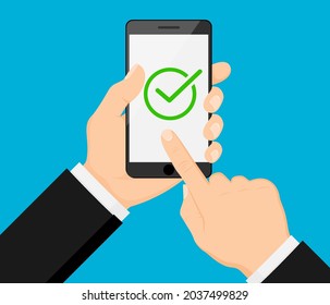 Hand holding smart phone. Check mark on smartphone screen.Approve, Done or Success icon. Finger on mobile device screen. Creative modern flat design.