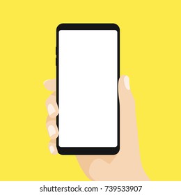 Hand holding smart phone on yellow background. Flat design