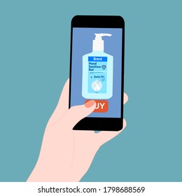 Hand holding smart phone and press buy button on the screen. Contactless online purchase of goods using your phone. Use Hand sanitizer tube. Diseases Wireless Technology. Home delivery.