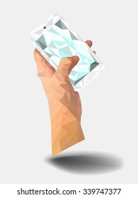 Hand holding smart phone Version.2 poly vector graphic.