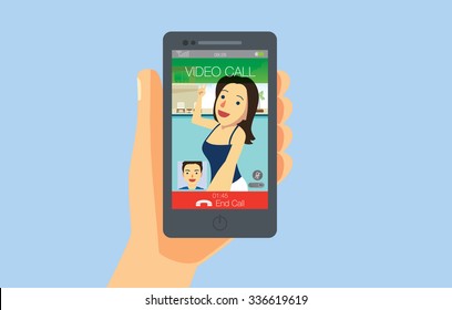 Hand holding smart phone which on screen showing video call from girlfriend.