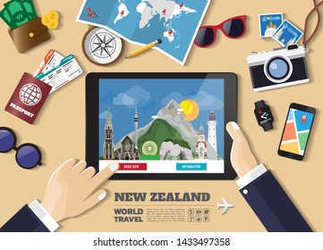 Hand holding smart tablet booking travel destination.New Zealand famous places.Vector concept banners in flat style with the set of traveling objects, accessories and tourism icon.