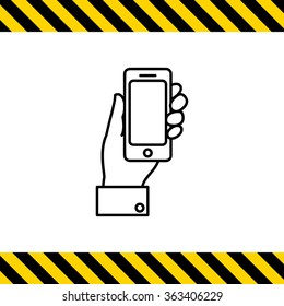 Hand holding smartphone