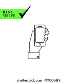 Hand holding smartphone