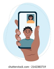 Hand holding a smartphone with active conversation on the touch screen. African American couple's video call. Young people chatting online with camera. Vector illustration in flat style.
