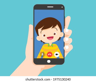 Hand holding smartphone with children boy on screen.Video call with cute boy or student.