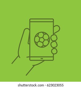 Hand holding smartphone color linear icon. Smart phone soccer game app. Thin line contour symbols on color background. Vector illustration