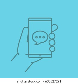 Hand holding smartphone color linear icon. Smart phone with chat box. Thin line contour symbols on color background. Vector illustration