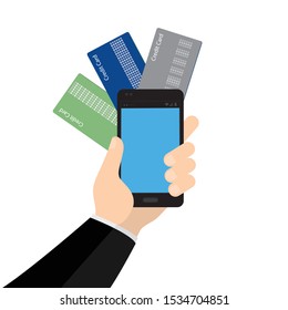 Hand holding smartphone with credit card on screen. Payment with smartphone concept.