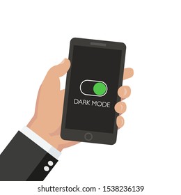 Hand holding smartphone with Dark and Light Mode Switcher for Phone Screens, tablets and computers. 