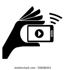 hand holding a smartphone device with video player button on screen over white background. entertainment and technology design. vector illustration