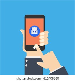 Hand holding smartphone with email icon. Flat style design