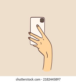 Hand holding smartphone, empty screen, phone mockup