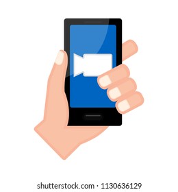 Hand holding a smartphone with a film icon