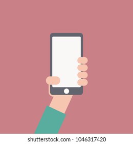 Mano sosteniendo un smartphone . Diseño plano