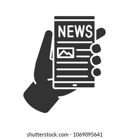 Hand holding smartphone glyph icon. Electronic newspaper. Online news. Silhouette symbol. Negative space. Vector isolated illustration