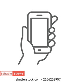 Hand holding smartphone icon. Simple outline style. Hold mobile phone with white screen. Thin line vector illustration isolated on white background. Editable stroke EPS 10.