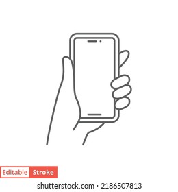 Hand holding smartphone icon. Simple outline style. Hold mobile phone with white screen. Thin line vector illustration isolated on white background. Editable stroke EPS 10.