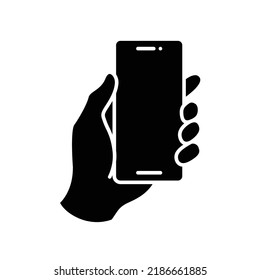Hand holding smartphone icon. Simple solid style. Hold mobile phone with white screen. Glyph vector illustration isolated on white background. EPS 10.