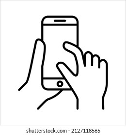 Hand holding smartphone icon. vector illustration on white background. color editable