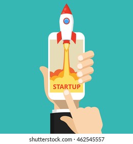 Hand holding smartphone with launch rocket on the screen. Successful startup business concept. Flat vector illustration.
