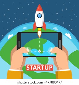 Hand holding smartphone with launch rocket on the screen. Successful startup business concept. Clouds, stars and earth on the background. Flat vector illustration.