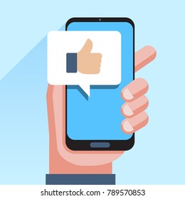 Hand holding smartphone with like message on screen, like button. Thumbs up icon. Social network, social media usage on mobile device. Concept for websites, web banner. Flat design vector illustration