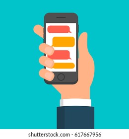 Hand holding smartphone with mobile messaging app. EPS10 vector illustration in flat style.