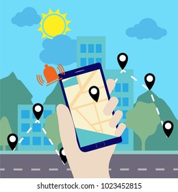 Hand holding a smartphone with navigation application on it