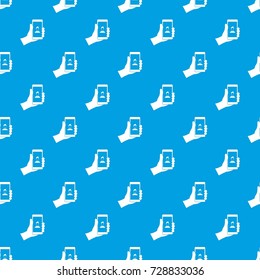 Hand holding smartphone with photo pattern repeat seamless in blue color for any design. Vector geometric illustration