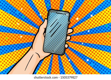 Hand holding smartphone in pop art style on yellow blue background. Vector illustration in vintage comic style.
